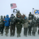 Veterans in support of Standing Rock march through a blizzard December 5, 2016.